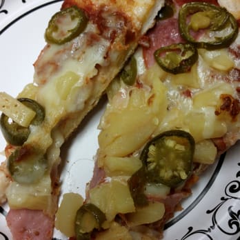 Antonio Pizza - Dark curly hair in between 2 slices of what would have been very delicious pizza :-( - Pizza Near Me - Riverside, California