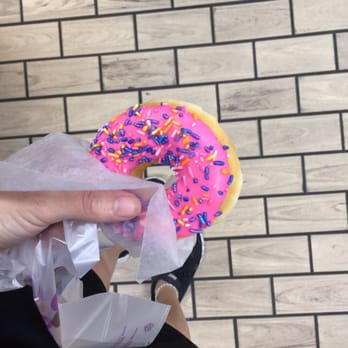 7-Eleven - a person holding a donut with sprinkles - Convenience Stores Near Me - Spring Valley, California 7-Eleven - a person holding a donut with sprinkles - Convenience Stores Near Me - Spring Valley, California