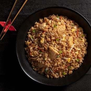 P.F. Chang's - a bowl of fried rice and chopsticks - Chinese Near Me - Maumee, Ohio P.F. Chang's - a bowl of fried rice and chopsticks - Chinese Near Me - Maumee, Ohio