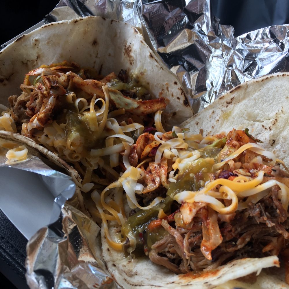 Muchachos Tacos & Food Truck - Brisket (left) and pork tacos. Brisket taco is a knockout, must-try item. - Food Trucks Near Me - Lincoln, Nebraska Muchachos Tacos & Food Truck - Brisket (left) and pork tacos. Brisket taco is a knockout, must-try item. - Food Trucks Near Me - Lincoln, Nebraska