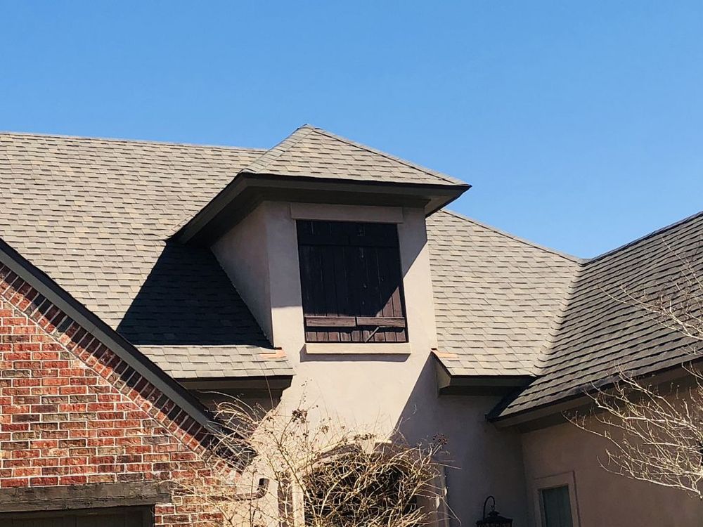 Slide of Pelican Roofing Company