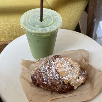 Composition Coffee - Iced Matcha Latte with an Almond Croissant - Coffee & Tea Near Me - West Palm Beach, Florida Composition Coffee - Iced Matcha Latte with an Almond Croissant - Coffee & Tea Near Me - West Palm Beach, Florida