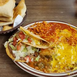 Jerry's Cafe - Combo Plate: Tostado, Beef Taco, Pork Tamale, Two Cheese Enchiladas, beans, rice, and Chili sauce