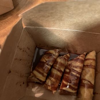 Yo Quiero Lumpia - Bananas with a side of creamy ice cream! - Food Delivery Services Near Me Yo Quiero Lumpia - Bananas with a side of creamy ice cream! - Food Delivery Services Near Me