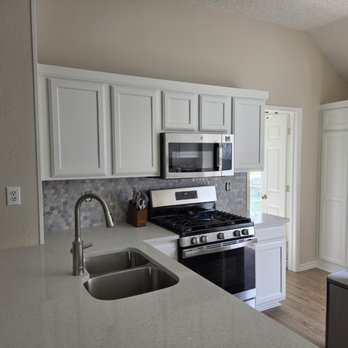 YourNextPainter & Remodeling - New cab doors, new tile backsplash, and new quartz tops - Painters Near Me YourNextPainter & Remodeling - New cab doors, new tile backsplash, and new quartz tops - Painters Near Me