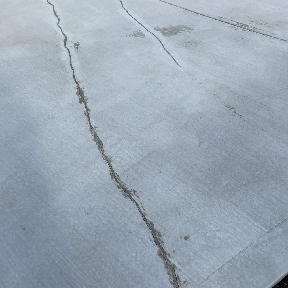 JR Concrete - The crack that he tried to repair on a new driveway. - Masonry/Concrete Near Me JR Concrete - The crack that he tried to repair on a new driveway. - Masonry/Concrete Near Me