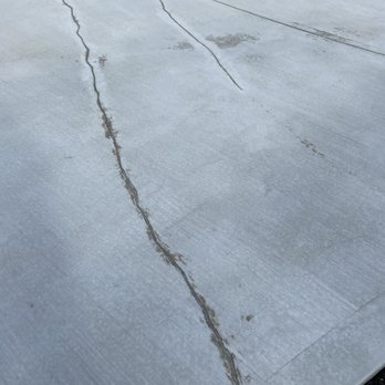 JR Concrete - The crack that he tried to repair on a new driveway. - Masonry/Concrete Near Me JR Concrete - The crack that he tried to repair on a new driveway. - Masonry/Concrete Near Me