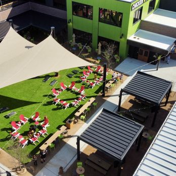 Chicken N Pickle - Drone view of the outdoor seating area of Chicken & Pickle - Venues & Event Spaces Near Me - Webster, Texas Chicken N Pickle - Drone view of the outdoor seating area of Chicken & Pickle - Venues & Event Spaces Near Me - Webster, Texas