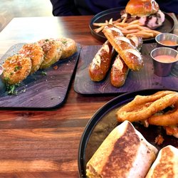 Tin Cup Social - Fried green tomatoes, soft pretzels, steakhouse burger with fries, garbage plate wrap with delicious onion rings!