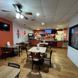 2 Compas Kitchen - Cute and clean interior with 6 tables and a little party room to the right.
