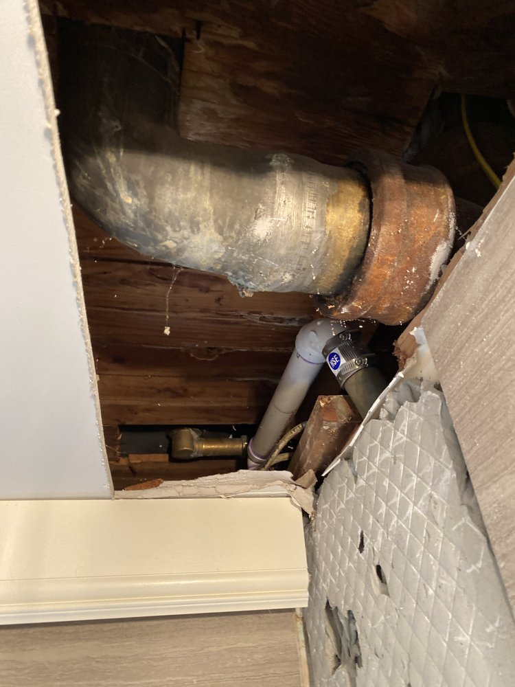 Slide of The in and out plumbing guy