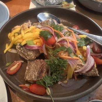 Thai Table Restaurant and Bar - Fried red snapper fish with spicy mango salad - Salad Near Me - Houston, Texas Thai Table Restaurant and Bar - Fried red snapper fish with spicy mango salad - Salad Near Me - Houston, Texas