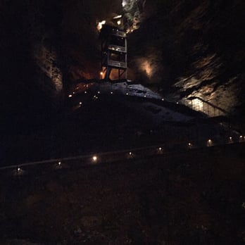 Silver Dollar City - This is the first decent into Manvel cave through a natural sink hole. The platform at the top is where you enter no elevator. - Amusement Parks Near Me - Branson, Missouri Silver Dollar City - This is the first decent into Manvel cave through a natural sink hole. The platform at the top is where you enter no elevator. - Amusement Parks Near Me - Branson, Missouri