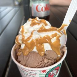 Main Street Creamery - This is chocolate ice cream with whip cream and peanut butter sauce. 1 scoop  oh and the Diet Coke bottle in the background.