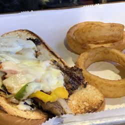 6 inch Philly $18 tasty but kinda skinny onion rings were fresh