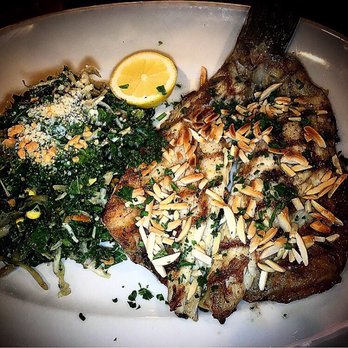 South Ocean Grill - Bronzino with kale salad! - Burgers Near Me - Patchogue, New York