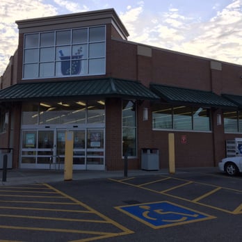 Walgreens - a car parked in front of the store - Drugstores Near Me - Lakeville, Minnesota