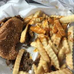 Bbq pork sandwich and fries. Bbq pork sandwich and fries.