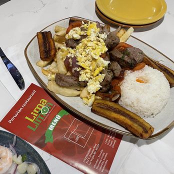 Lima Limon - #25 steak, onions, tomato, eggs, rice, French fries and plantains - great dish! - Peruvian Near Me - Las Vegas, Nevada Lima Limon - #25 steak, onions, tomato, eggs, rice, French fries and plantains - great dish! - Peruvian Near Me - Las Vegas, Nevada