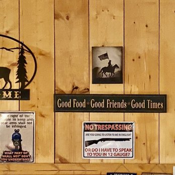 Canyon Springs Stage Stop - a wooden wall with various signs - Steakhouses Near Me - Newcastle, Wyoming Canyon Springs Stage Stop - a wooden wall with various signs - Steakhouses Near Me - Newcastle, Wyoming