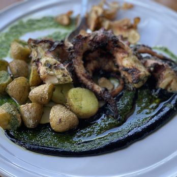 Rusty Pelican - Miami - Grilled Herb Marinated Octopus - Seafood Near Me - Key Biscayne, Florida Rusty Pelican - Miami - Grilled Herb Marinated Octopus - Seafood Near Me - Key Biscayne, Florida