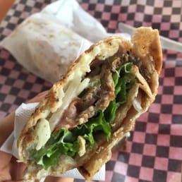 Small wheat Greek donair with veggies. Yum! Small wheat Greek donair with veggies. Yum!