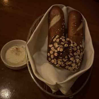 Le Cellier Steakhouse - Bread service with this delicious pretzel bread and maple butter - Steakhouses Near Me - Orlando, Florida Le Cellier Steakhouse - Bread service with this delicious pretzel bread and maple butter - Steakhouses Near Me - Orlando, Florida