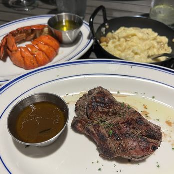 Zeke's Restaurant - Filet, lobster, marrow butter, red mashed with roasted garlic. - Salad Near Me - Orange Beach, Alabama Zeke's Restaurant - Filet, lobster, marrow butter, red mashed with roasted garlic. - Salad Near Me - Orange Beach, Alabama
