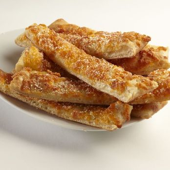 New Orleans Pizza - a plate of baked breadsticks - Pizza Near Me - Waterloo, Ontario New Orleans Pizza - a plate of baked breadsticks - Pizza Near Me - Waterloo, Ontario
