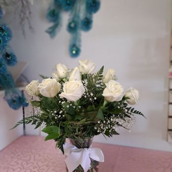 Renaissance Flower Shop - This is a clear bave with 12 white rose for a sympathy. - Flowers & Gifts Near Me - Pomona, California Renaissance Flower Shop - This is a clear bave with 12 white rose for a sympathy. - Flowers & Gifts Near Me - Pomona, California