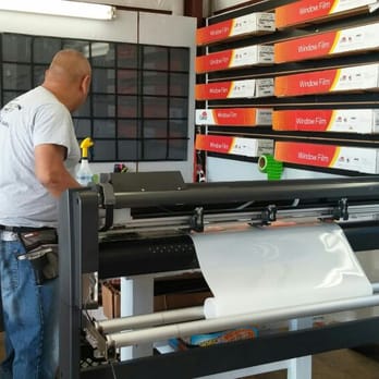 Protection Unlimited - Cutting out some paint protection film. Getting ready to apply it on the hood of a customers car. - Auto Glass Services Near Me - San Marcos, Texas Protection Unlimited - Cutting out some paint protection film. Getting ready to apply it on the hood of a customers car. - Auto Glass Services Near Me - San Marcos, Texas