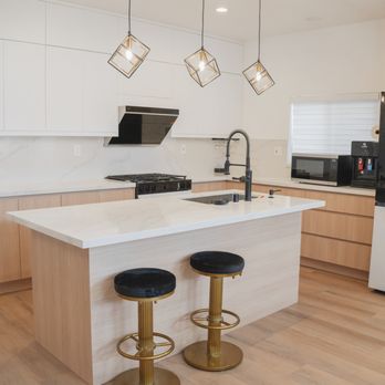 Perfect Precision Home Designs - Custom EGGER Vicenza Oak base cabinets paired with Pure White uppers for a sleek, modern contrast. A perfect blend of warmth and minimalism. - Cabinetry Near Me Perfect Precision Home Designs - Custom EGGER Vicenza Oak base cabinets paired with Pure White uppers for a sleek, modern contrast. A perfect blend of warmth and minimalism. - Cabinetry Near Me