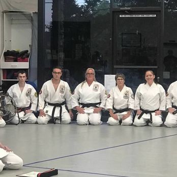 Bennati's Martial Arts - Me (center) with my son Garhett at his black belt promotion ceremony. So proud! - Martial Arts Near Me - Auburn, California