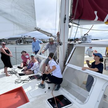 Lookout Cruises - Hoisting the main sail - Boat Tours Near Me - Beaufort, North Carolina
