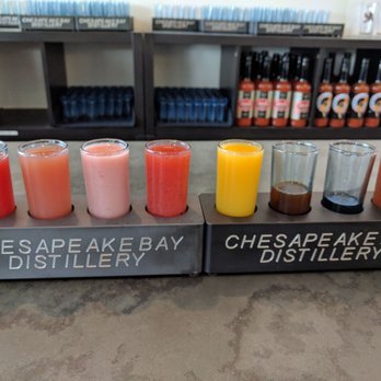 Chesapeake Bay Distillery - L to R: Bri Berry, Alligator Piss, Strawberry Colada, Pungo Mule, Angry Mango, Espresso, Ghost Pepper Vodka, Crabby Ghost - Distilleries Near Me - Virginia Beach, Virginia