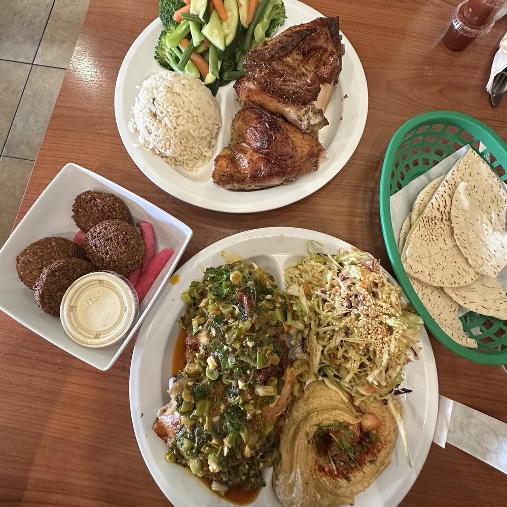 1/2 Spicy Lemon Garlic Chicken A La Carte 1/2 Chicken Original Falafel Plate Maison rice Spicy hummus Spicy/sweet coleslaw