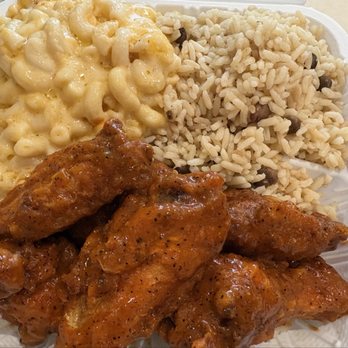 Gretel and Sons - wings in buffalo sauce with Mac n cheese and rice and peas - Soul Food Near Me - Westbury, New York Gretel and Sons - wings in buffalo sauce with Mac n cheese and rice and peas - Soul Food Near Me - Westbury, New York