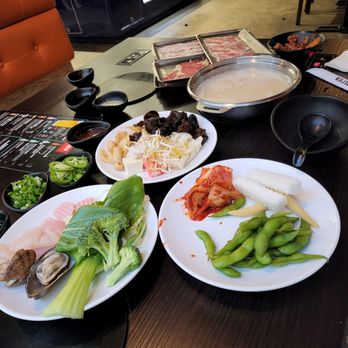 Shabuya - A few starter plates with the tonkatsu broth - Hot Pot Near Me - Honolulu, Hawaii