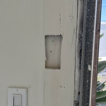 MEGA Remodeling Solutions - They also left things like this, where the old garage opener switch was. No effort. - Flooring Near Me