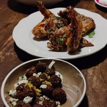 Casa Bianca - Fried Olives Stuffed With Herbs, Confit + Fried Chicken Wings, and Dressed Raw Oysters - Wine Bars Near Me - Austin, Texas