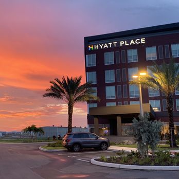 Hyatt Place Melbourne Airport - Exterior at Sunset - Hotels Near Me - Melbourne, Florida
