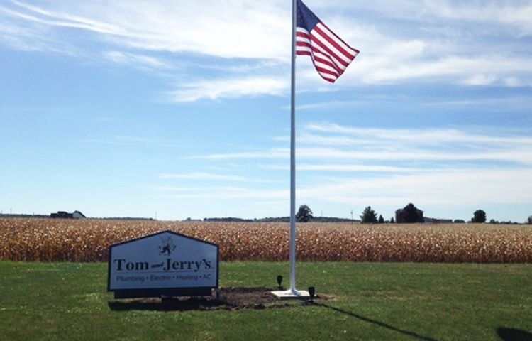 Slide of Tom & Jerry's Plumbing Electric Heating Air Conditioning
