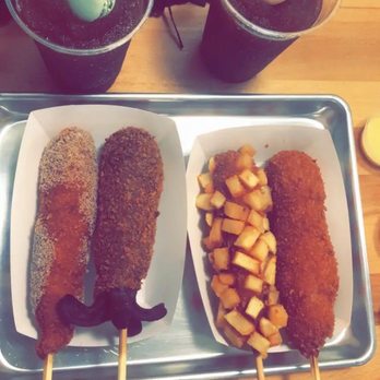 Seoul Hotdog - Frosty Coke Slushes with Macaroons  Cheddar Sausage Hot Dog / cover with sugar  Squid ink Hot Dog Potato Hotdog Mozza Sausage Hotdog - Hot Dogs Near Me - Berkeley, California