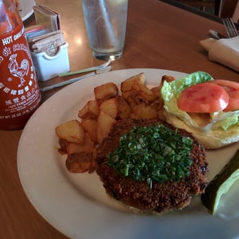 Megg's Cafe - Veggie Burger with house potatoes and pickle. Sriracha on the side - Bakeries Near Me - Temple, Texas