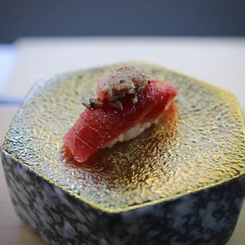 Nigiri - Tuna topped with shittake mushrooms and truffle oil and pad of broiled tuna on top - Sushi Bars Near Me - Jersey City, New Jersey Nigiri - Tuna topped with shittake mushrooms and truffle oil and pad of broiled tuna on top - Sushi Bars Near Me - Jersey City, New Jersey