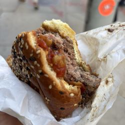 Gordon Ramsay Burger - One of the burgers- partly eaten and then remembered photo- nice and juicy on the inside!