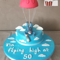 Cherry On The Cake - Flying high cake celebrating 50 years.