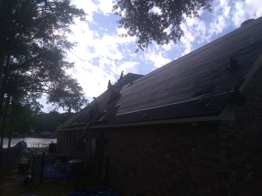 Slide of El Sol Roofing