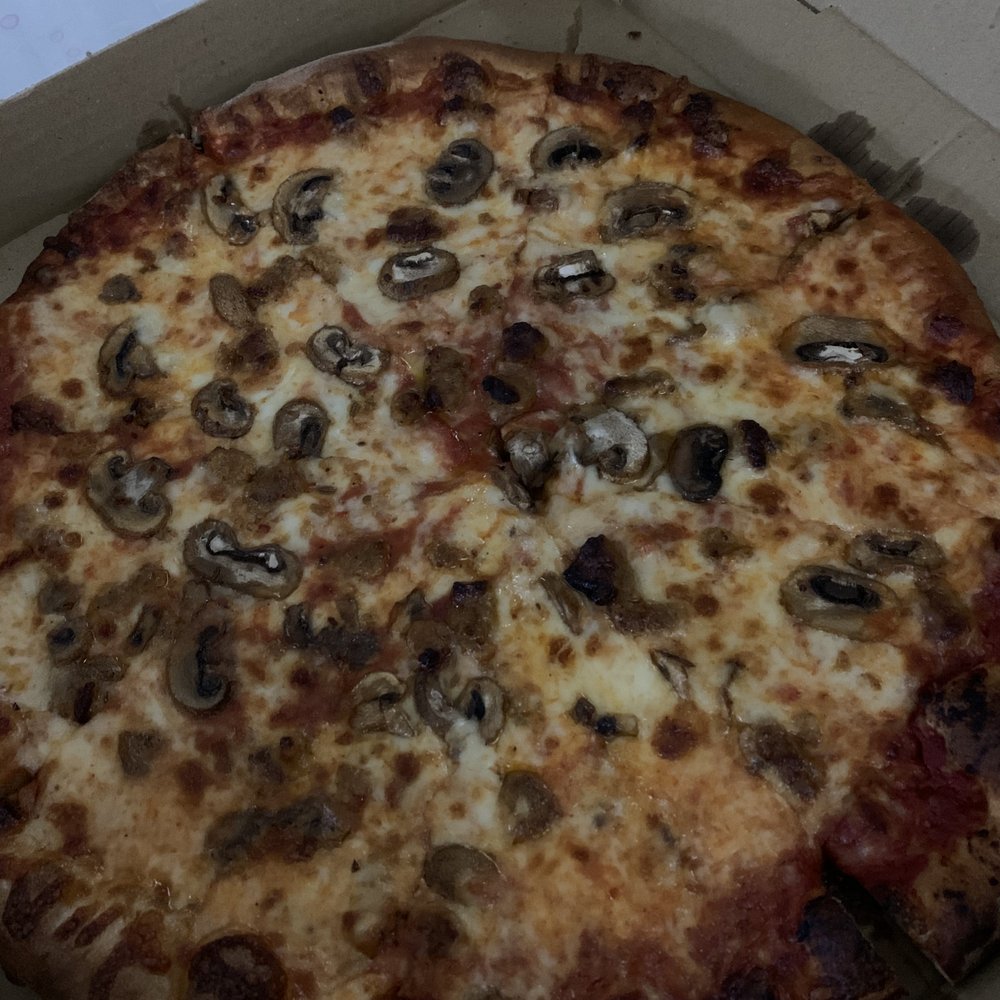 The Grove - Pizza with mushrooms and sausage - Italian Near Me - Hobe Sound, Florida The Grove - Pizza with mushrooms and sausage - Italian Near Me - Hobe Sound, Florida