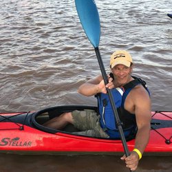 Canoesport Outfitters - Owner Jeff Homes test paddling a Stellar Kayak.